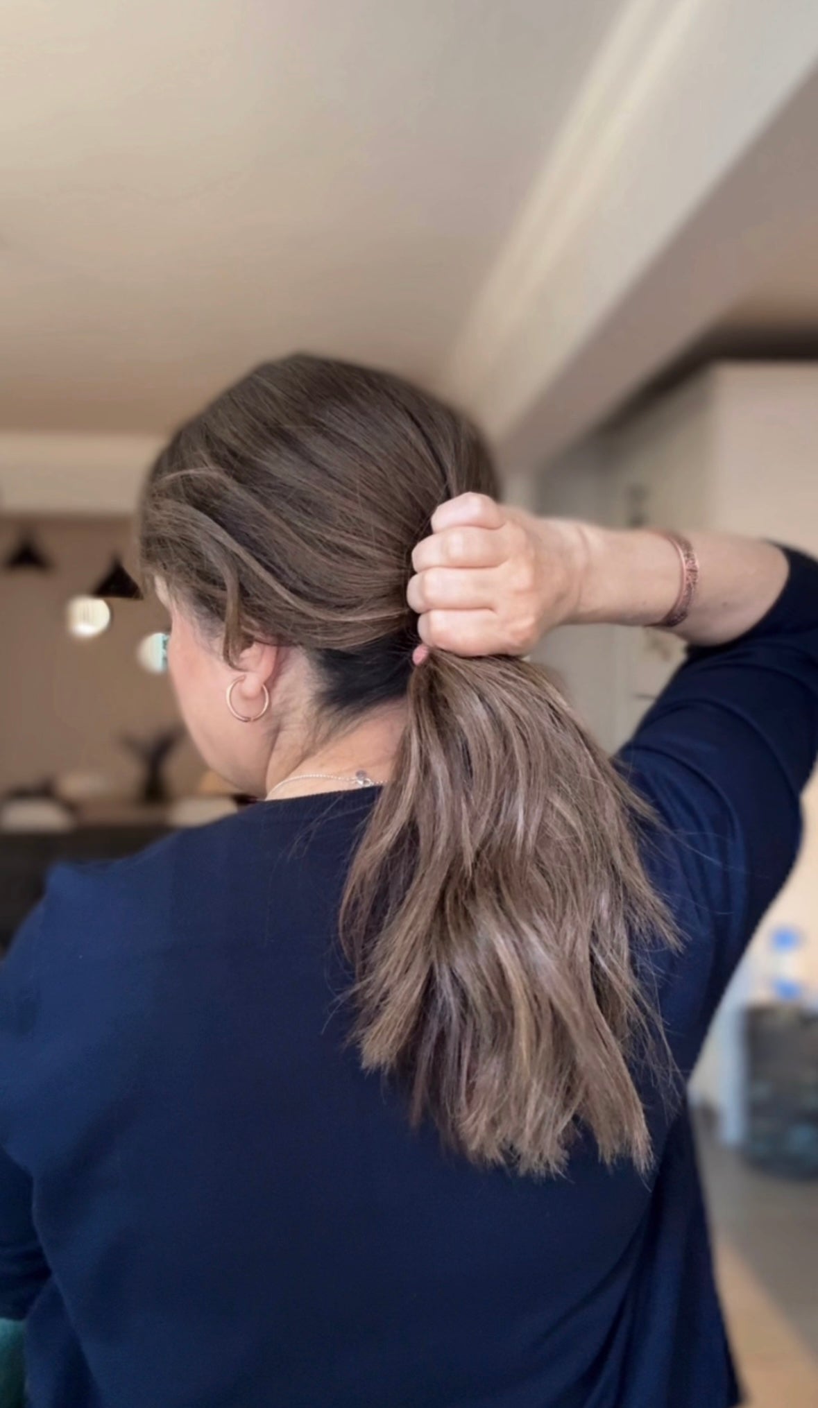 FEATHERLITE ASHY TOPPER WITH CURTAIN BANG