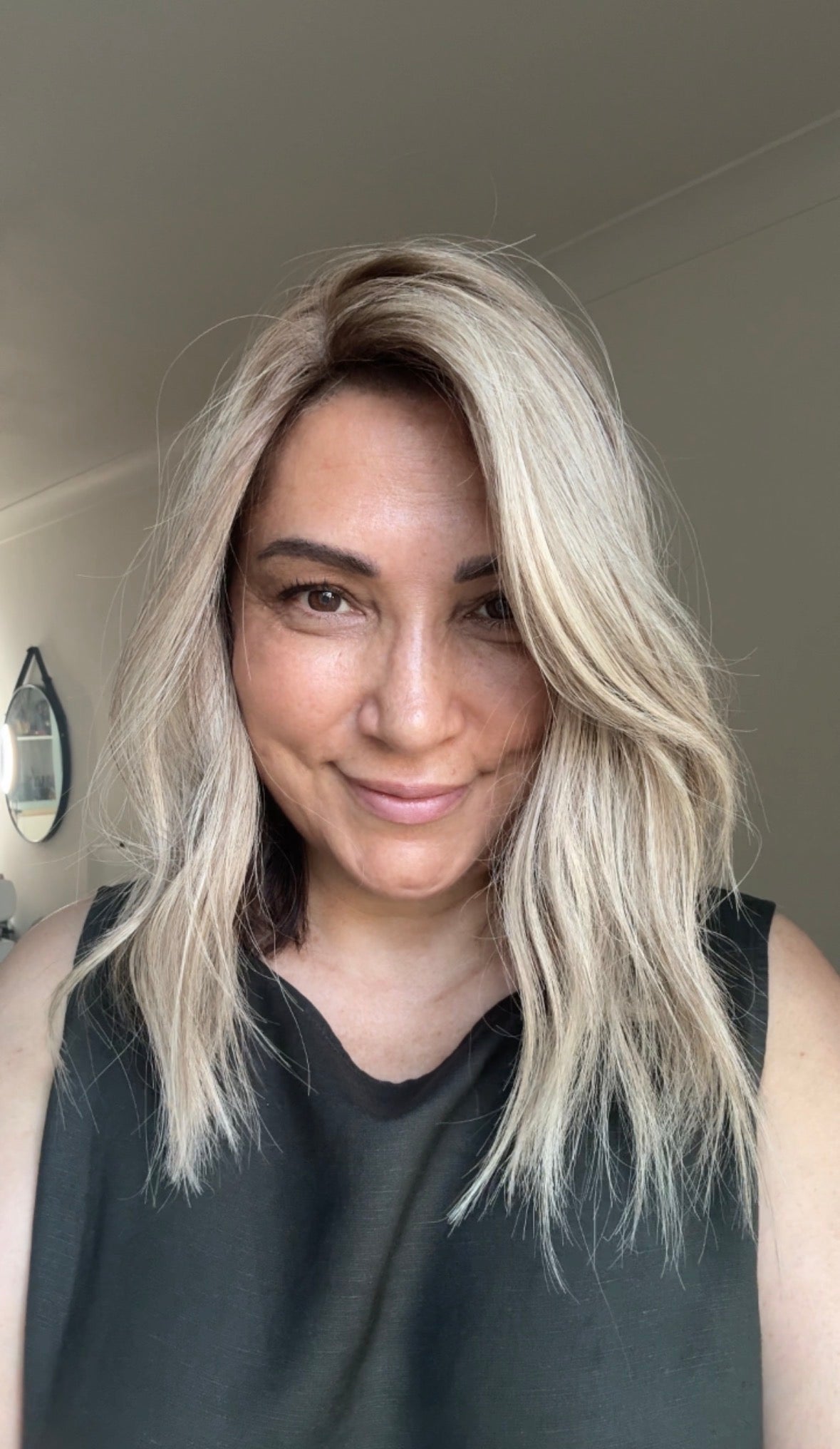 ASH BLONDE TOPPER WITH SUBTLE SOFT ROOT SHADOW
