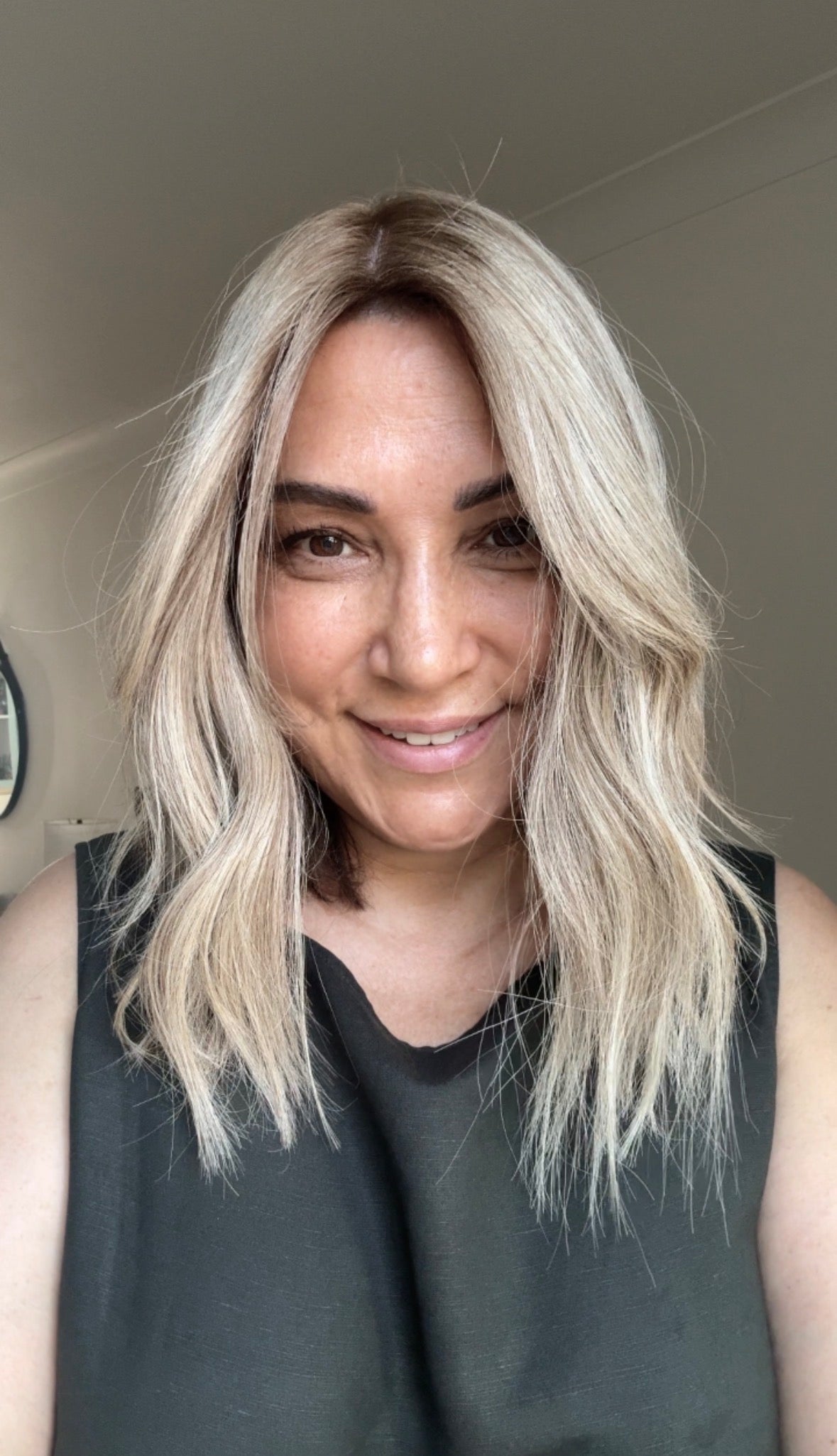 ASH BLONDE TOPPER WITH SUBTLE SOFT ROOT SHADOW