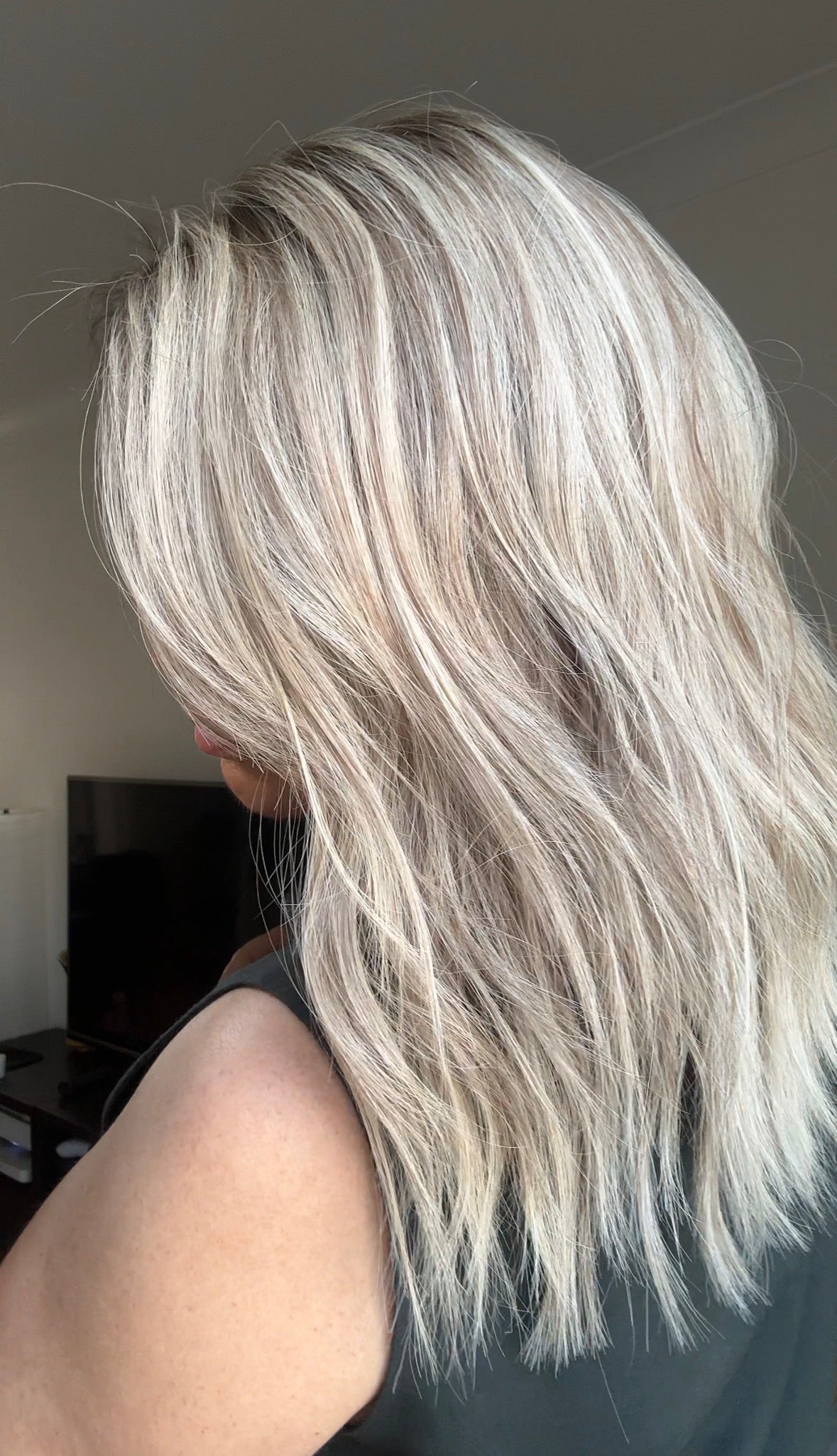 ASH BLONDE TOPPER WITH SUBTLE SOFT ROOT SHADOW