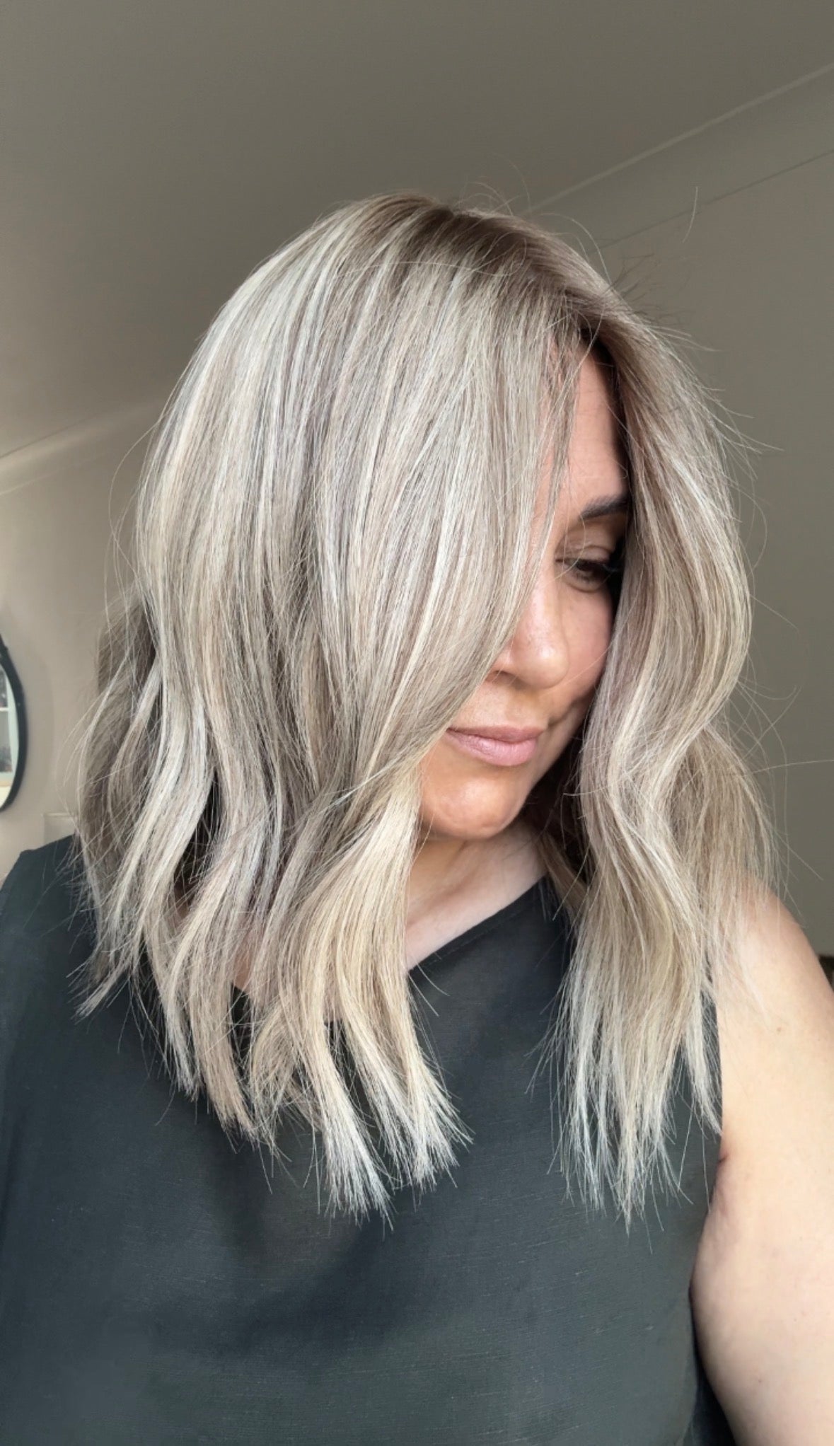 ASH BLONDE TOPPER WITH SUBTLE SOFT ROOT SHADOW