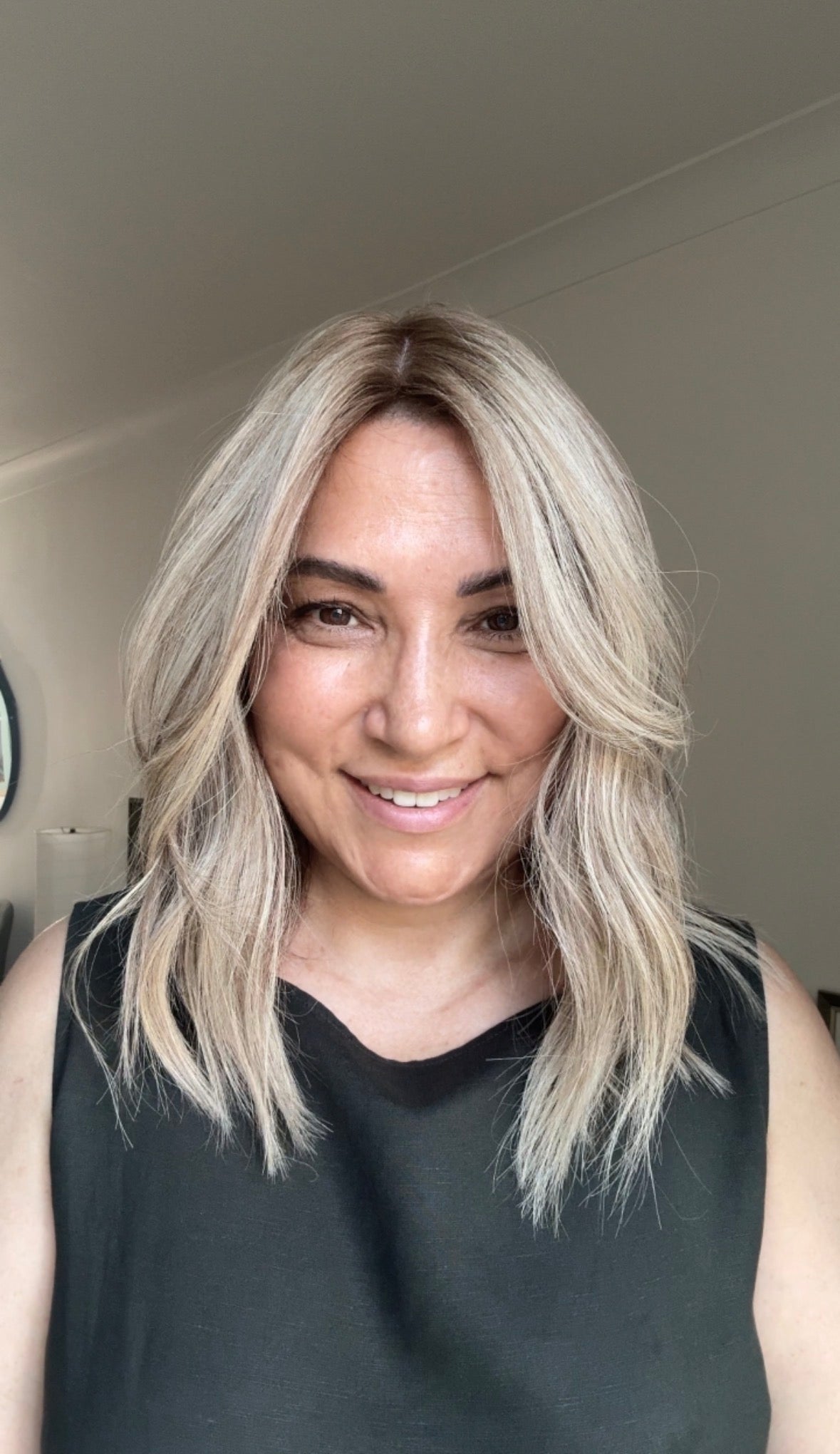 ASH BLONDE TOPPER WITH SUBTLE SOFT ROOT SHADOW