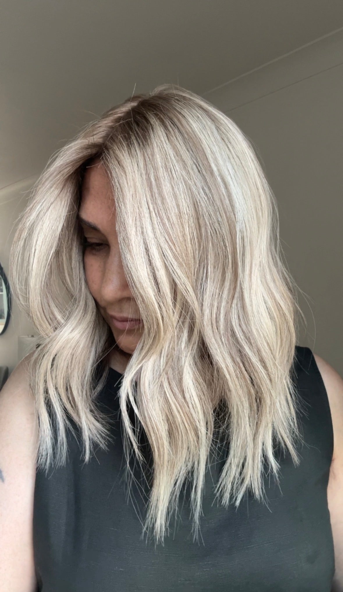 ASH BLONDE TOPPER WITH SUBTLE SOFT ROOT SHADOW