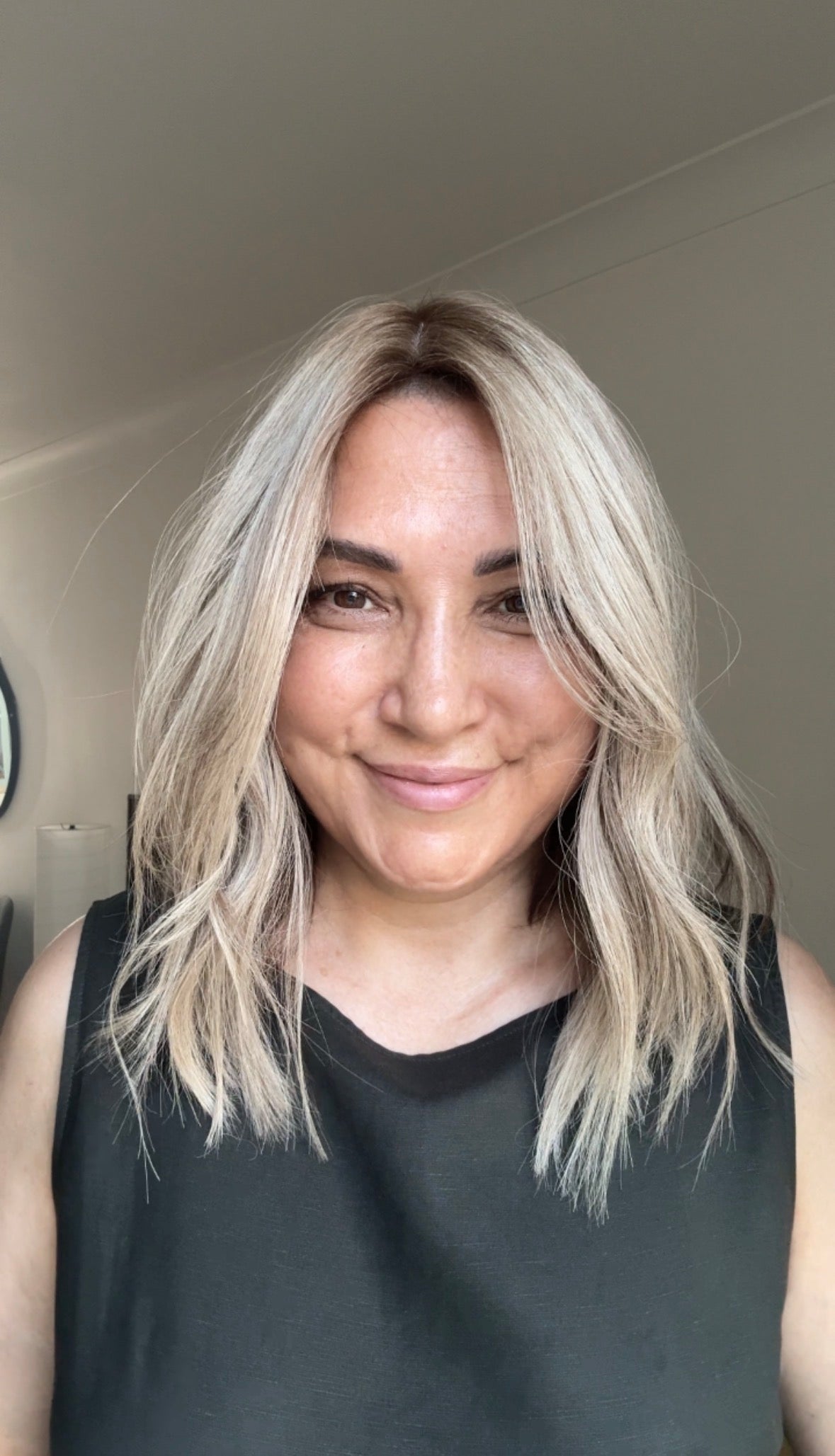 ASH BLONDE TOPPER WITH SUBTLE SOFT ROOT SHADOW